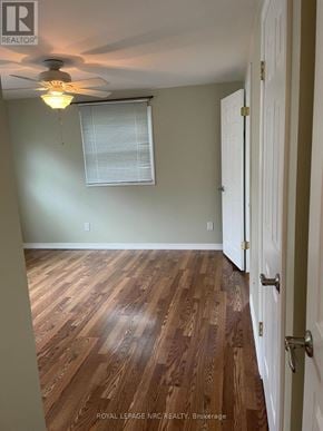 Fort Erie (Ridgeway) apartment for rent - A room with a ceiling fan and wooden flooring.