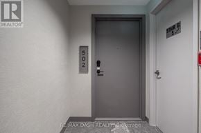 Toronto (Church-Yonge Corridor) condo for rent - A door with a number 502 on it is in a hallway.