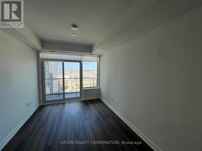 Vaughan (Vaughan Corporate Centre) condo for rent - A room with a view of a construction site through the window.