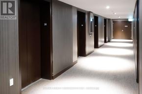 Mississauga (City Centre) condo for rent - A hallway with elevator doors numbered 36 to 38.