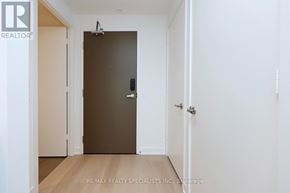 Mississauga (City Centre) condo for rent - A room with a brown door and a white door.