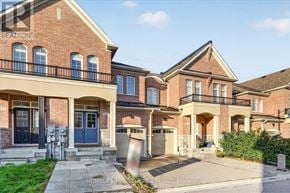 Newmarket (Glenway Estates) townhouse for rent - A row of houses with a clear blue sky above them.