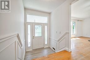 Burlington (Shoreacres) apartment for rent - A room with a white door and a window with blinds.