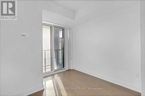 Toronto (Mimico) condo for rent - A room with a window and a door.