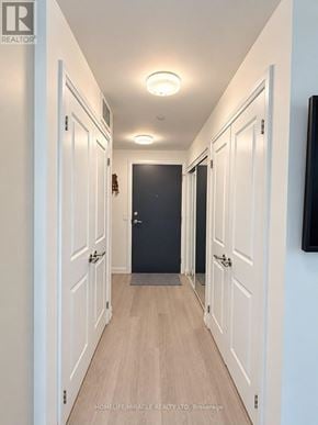 Brampton (Bram East) townhouse for rent - A hallway with white doors and a wooden floor.
