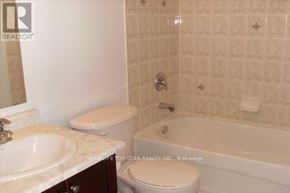Markham (Cornell) apartment for rent - A bathroom with a toilet, sink, and bathtub.