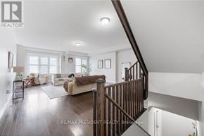 Brampton (Northwest Brampton) townhouse for rent - A well-lit, spacious living room with a staircase leading to the upper floor.