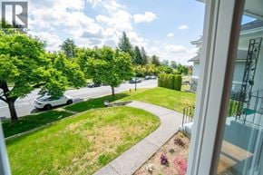 Vancouver apartment for rent - A white car is parked on the street.