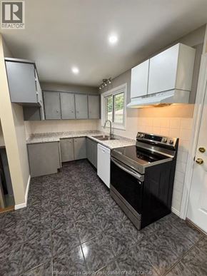 Windsor apartment for rent - A house with a lawn in front of it.