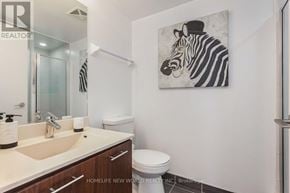 Toronto (Agincourt South-Malvern West) condo for rent - A bathroom with a zebra painting on the wall.