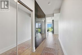 Niagara Falls (Oldfield) condo for rent - A hallway with a glass door leading to a balcony.