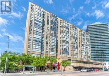 Toronto (Willowdale West) condo for rent - A tall building with many windows is the main focus of the image.