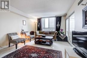 Toronto (Willowdale West) condo for rent - A living room with a rug and a couch.