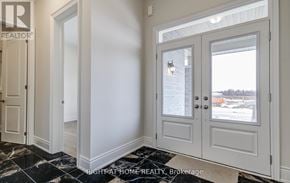 Georgina (Keswick South) apartment for rent - A room with a marble floor and white walls with a door and window.