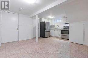 Newmarket (Bristol-London) apartment for rent - A kitchen with a refrigerator, sink, and oven.