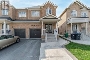 Brampton (Credit Valley) apartment for rent - A house with a car parked in front of it.
