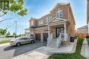 Brampton (Credit Valley) apartment for rent - A house with a car parked in front of it.