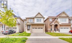 Thorold (Hurricane/Merrittville) apartment for rent - A large, well-maintained house with a car parked in front.