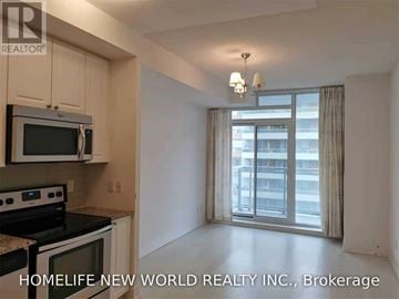 Toronto (Mount Pleasant West) condo for rent - A kitchen with a stove top oven and microwave with a window in the background.