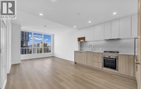 Burnaby apartment for rent - A spacious kitchen with wooden floors and modern appliances.