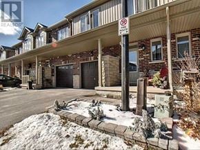 Grimsby (Grimsby Beach) townhouse for rent - A house with a sign that says "No Fire Route".