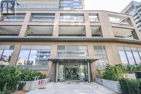Toronto (Henry Farm) condo for rent - The image shows a modern building with a glass entrance and a sign that reads "Union Capital Realty Brokerage."