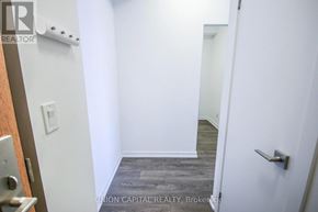 Toronto (Henry Farm) condo for rent - A white door with a silver handle is on the right side of the image.