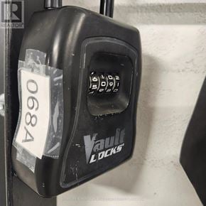 Milton (Tm Timberlea) condo for rent - A black Vault Locks keypad is labeled with the number 0684.
