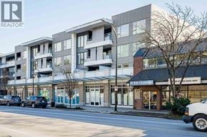 North Vancouver townhouse for rent - A street view of a building with cars parked in front and a sign that says "KSI Learning".