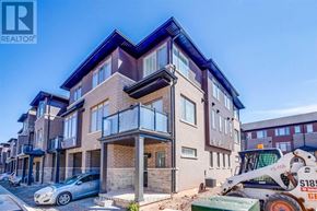Hamilton (Parkview) townhouse for rent - A modern two-story house with a balcony and a car parked in front.