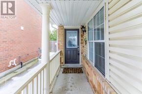 Milton (Cl Clarke) apartment for rent - A balcony with a black door and a white railing.