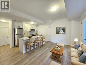 Waterdown townhouse for rent - A well-lit kitchen with a dining table and chairs.