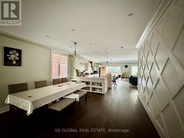 Markham (Berczy) apartment for rent - A dining room with a long table and chairs.