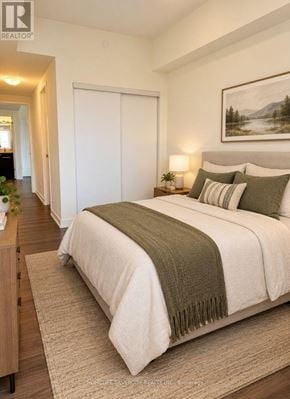 Toronto (Glenfield-Jane Heights) condo for rent - A bedroom with a large bed and a painting on the wall.