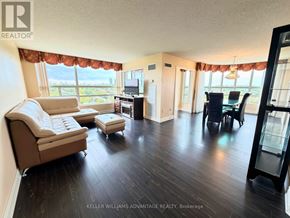 Markham (Aileen-Willowbrook) condo for rent - A living room with a couch, chair, and television.