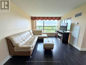 Markham (Aileen-Willowbrook) condo for rent - A living room with a couch, ottoman, and television.