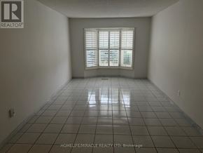 Mississauga (East Credit) apartment for rent - A room with tiled flooring and a window with blinds.