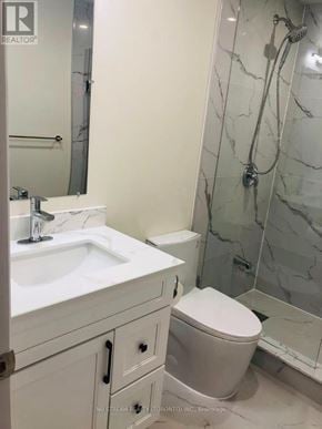 Whitby apartment for rent - A white sink and toilet in a bathroom.