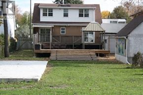 Toronto (Clairlea-Birchmount) apartment for rent - A house with a deck and a skateboard ramp in front.