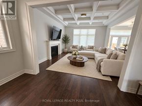 Oakville (Nw Northwest) apartment for rent - A living room with a fireplace and a couch.