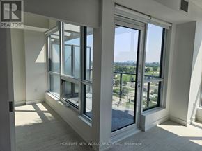 Toronto (York University Heights) condo for rent - A room with a view of the city through large windows.