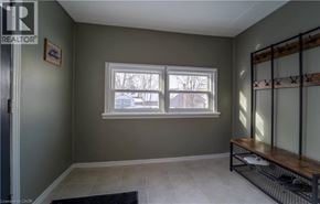 Kitchener apartment for rent - A room with a window and a bench.