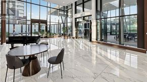 Toronto (Bayview Village) condo for rent - A modern dining area with a piano and a view of the outside.