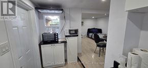 Oakville (Wo West) apartment for rent - A room with a bed, desk, and chair.