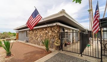 Cathedral City apartment for rent - A house with a flag on the front.