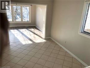 Hamilton apartment for rent - A room with a window and a door leading outside.