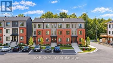 Ottawa townhouse for rent - A brokerage sign is displayed in the upper left corner of a real estate photo.
