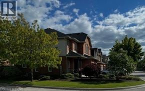 Burlington apartment for rent - A house with a tree in front of it.