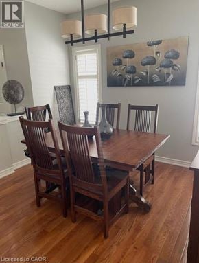 Burlington apartment for rent - A dining room with a wooden table and chairs.