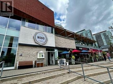 Toronto (Niagara) condo for rent - The front of a building with a sign that says NODO.